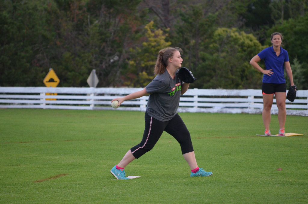 Pitcher Lauren Wylie delivered a strong underarm throw. Buy Photos